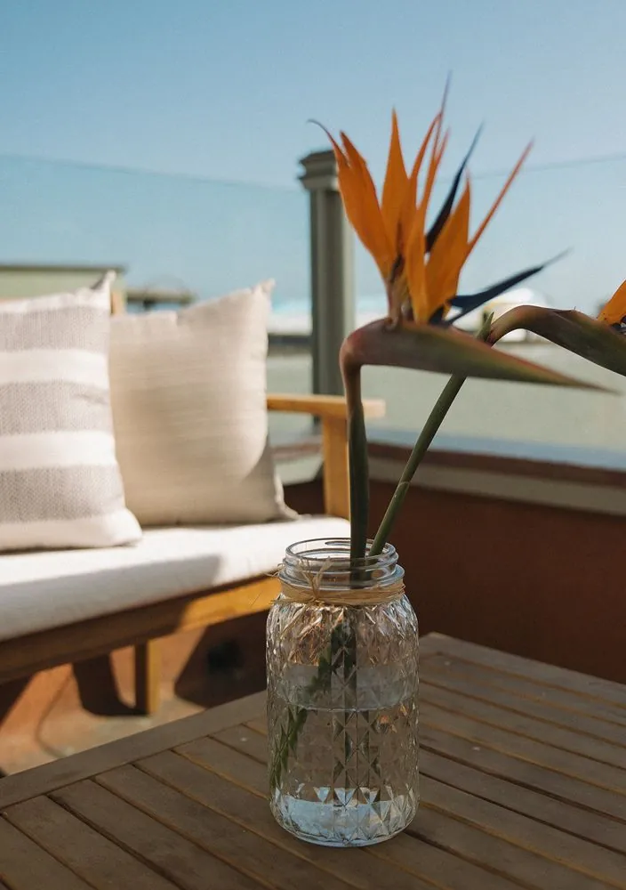 Cushion and flower on the deck